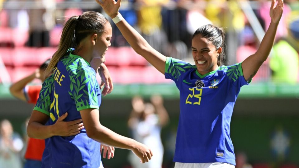 Brazil's forward Gabi Nunes (R) celebrates with teammates during the friendly football match between Brazil and Chile, ahead of the upcoming FIFA Women's World Cup, at the Arena BRB Mane Garrincha stadium in Brasilia on July 2, 2023. (Photo by EVARISTO SA / AFP)