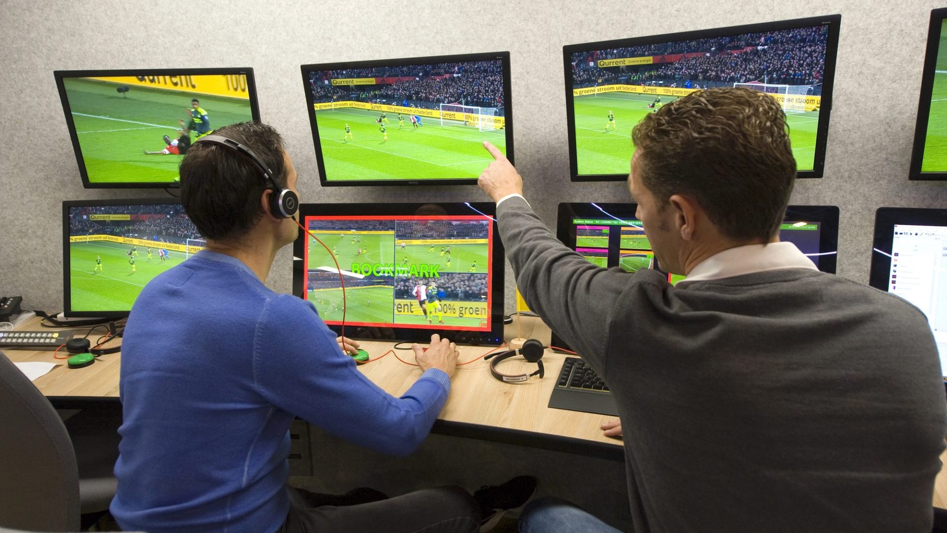 ZEIST, THE NETHERLANDS – NOV 30, 2018: VAR referee Bas Nijhuis (left) and his operator Mike van der Roest (right) worki
