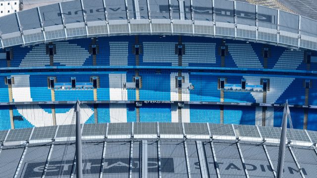 An aerial view of the City logo in the seats during the Premier League match Manchester City vs Leicester City at Etihad Stadium, Manchester, United Kingdom, 2nd April 2025 — Photo by operations@newsimages.co.uk
