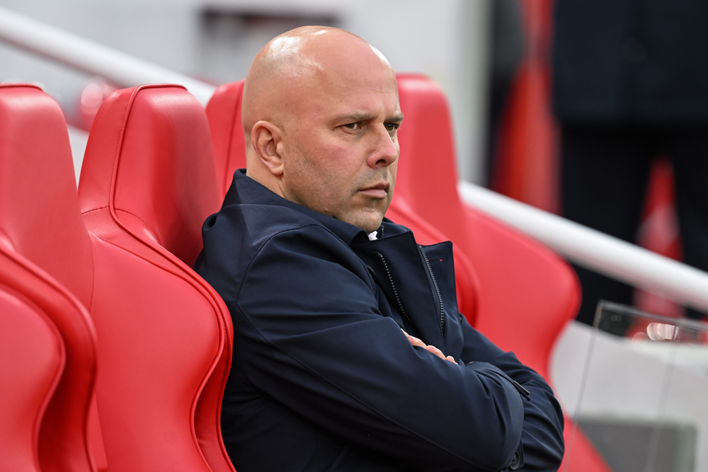 Arne Slot Head Coach of Liverpool watches on the warm ups ahead of the Premier League match Liverpool vs Brighton and Hove Albion at Anfield, Liverpool, United Kingdom, 2nd November 2024 — Photo by operations@newsimages.co.uk