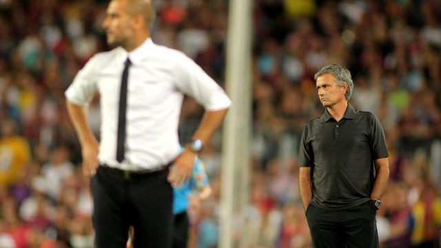 Guardiola of Barcelona and Mourinho of Madrid during the Spanish Supercup football match between Barcelona vs Real Madrid at the New Camp Stadium in Barcelona, on August 17, 2011 — Photo by Maxisports