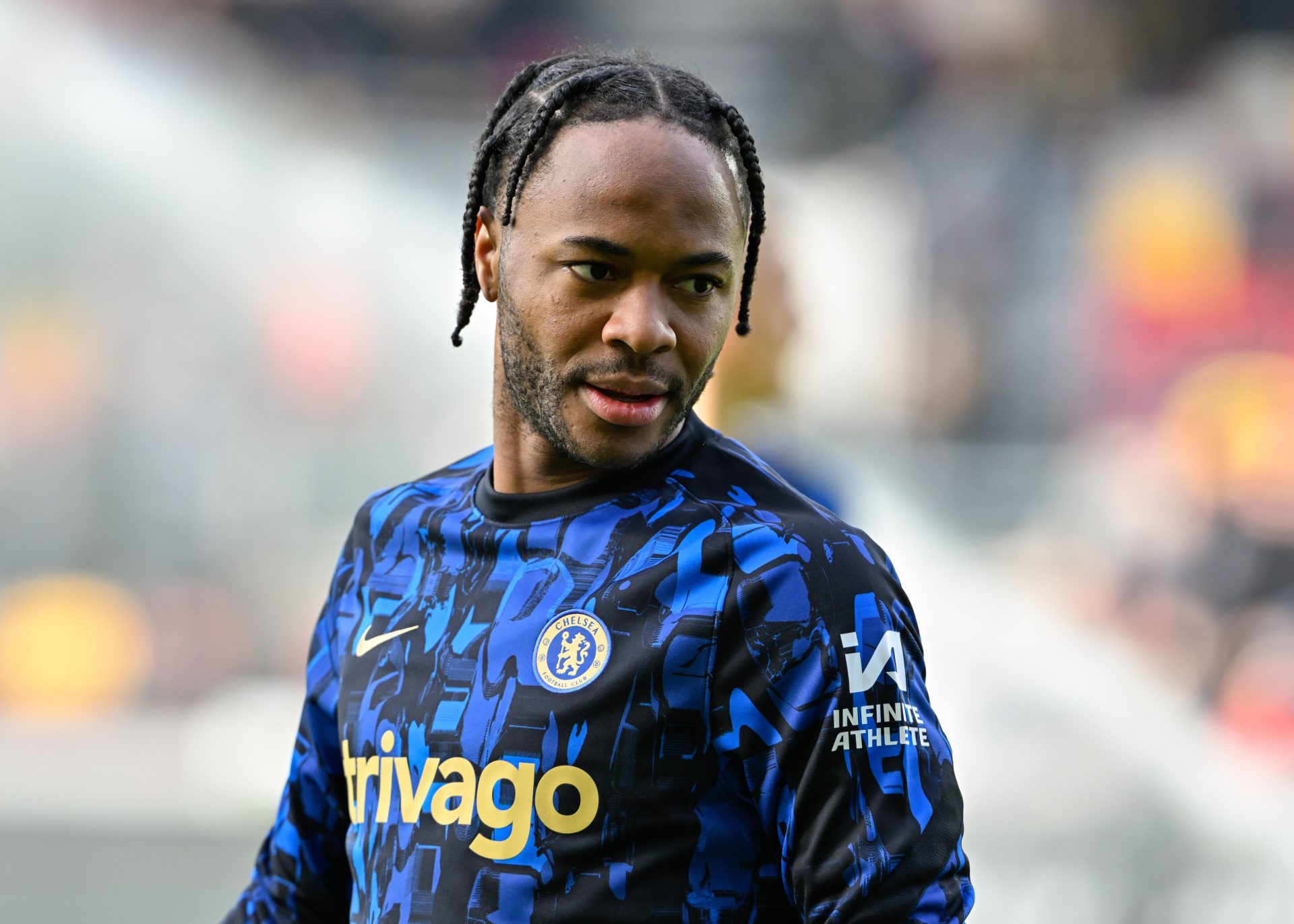 Raheem Sterling of Chelsea warms up ahead of the match, during the Premier League match Brentford vs Chelsea at The Gtech Community Stadium, London, United Kingdom, 2nd March 202 — Photo by operations@newsimages.co.uk