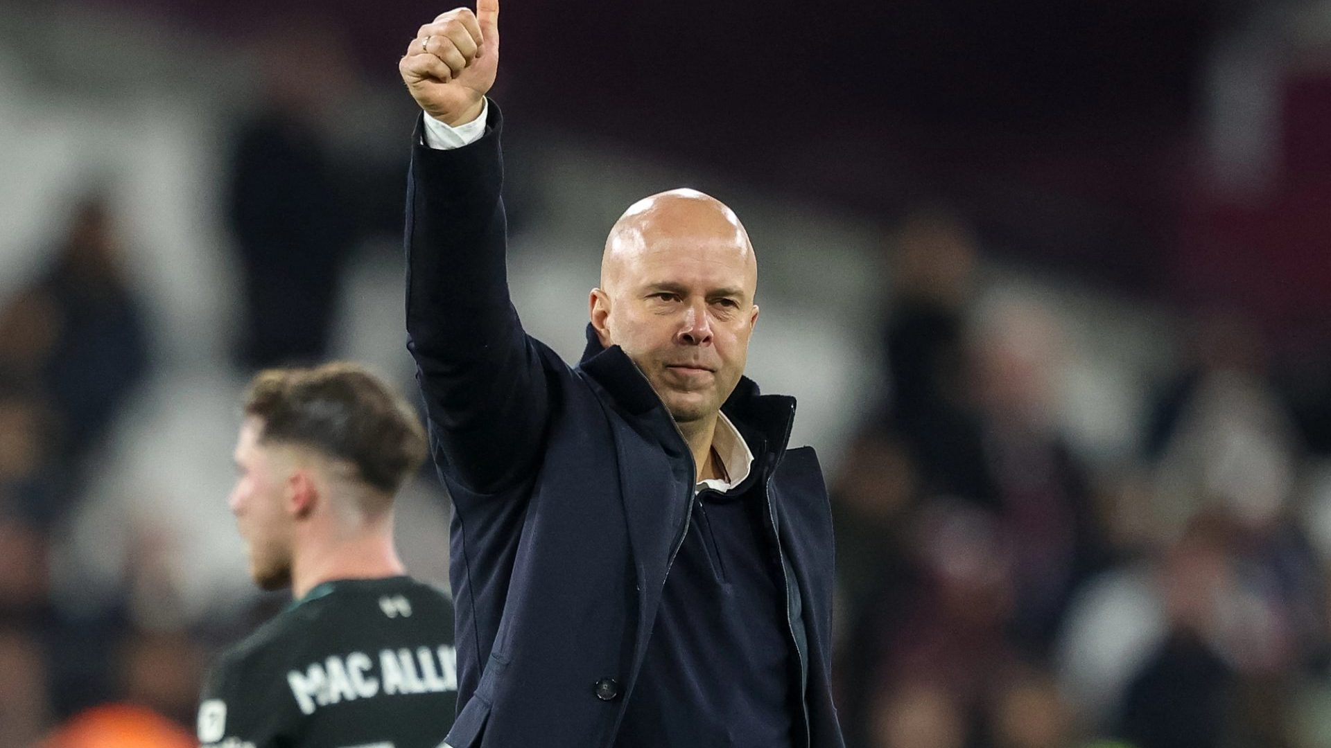 Arne Slot manager of Liverpool gives the traveling fans the thumbs up after winning 0-5 during the Premier League match West Ham United vs Liverpool at London Stadium, London, United Kingdom, 29th December 2024 — Photo by operations@newsimages.co.uk