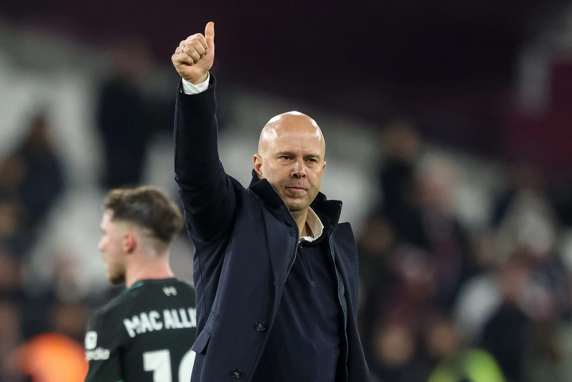 Arne Slot manager of Liverpool gives the traveling fans the thumbs up after winning 0-5 during the Premier League match West Ham United vs Liverpool at London Stadium, London, United Kingdom, 29th December 2024 — Photo by operations@newsimages.co.uk