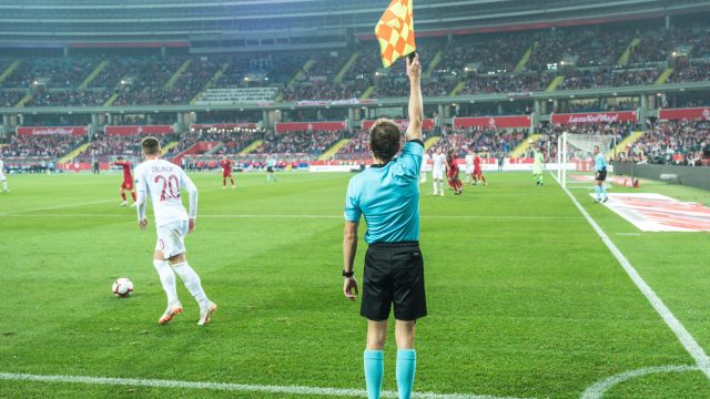 CHORZOW, POLAND - OCTOBER 11, 2018: Football Nations League division A group 3 match Poland vs Portugal 2:3 . In the picture assistant of referee. — Stock Editorial Photography