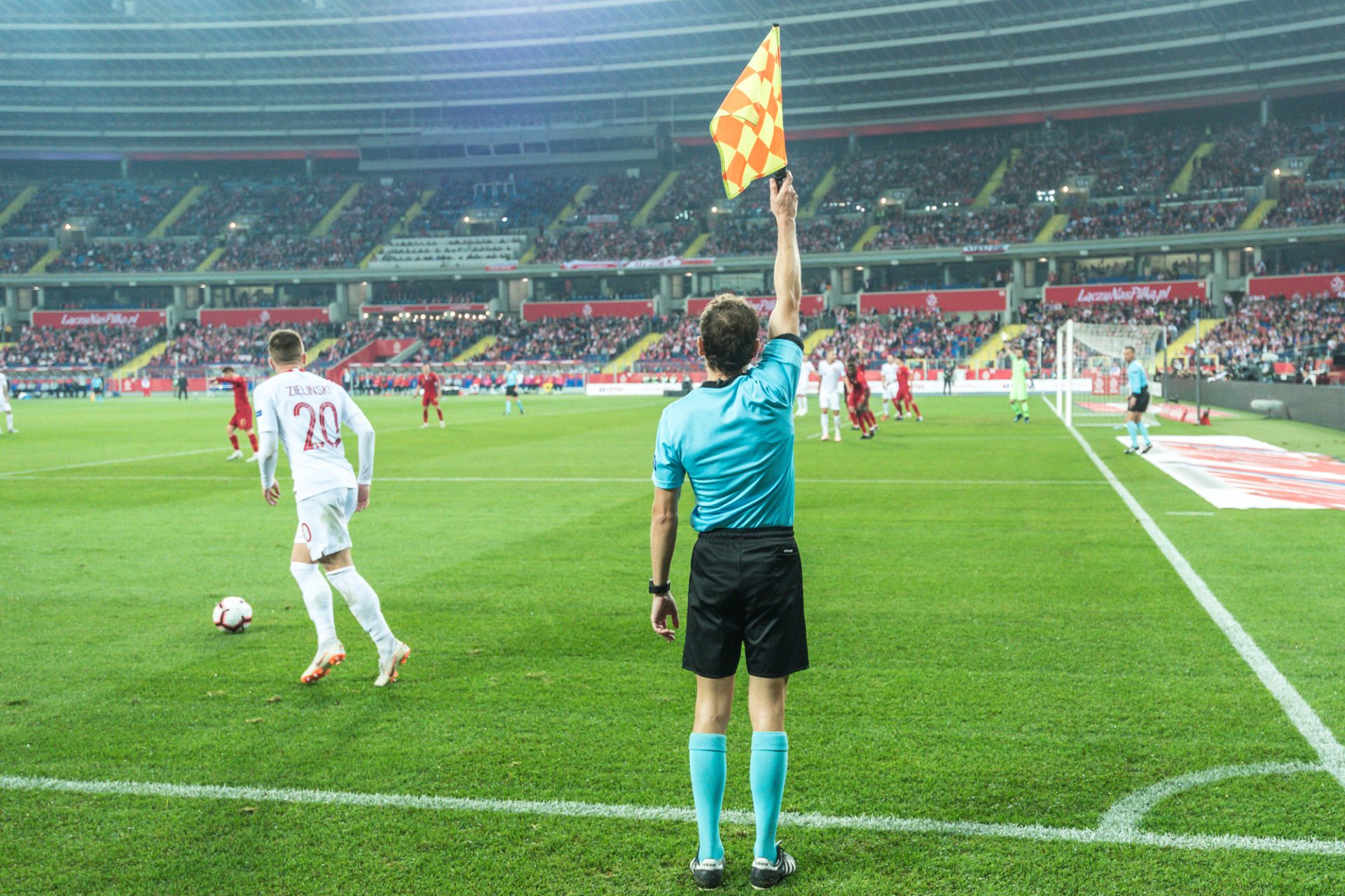 CHORZOW, POLAND - OCTOBER 11, 2018: Football Nations League division A group 3 match Poland vs Portugal 2:3 . In the picture assistant of referee. — Stock Editorial Photography