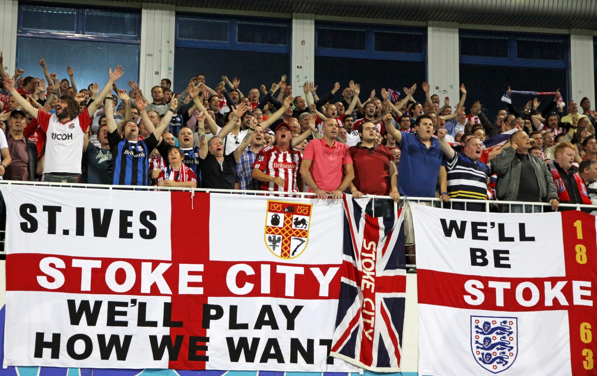KYIV, UKRAINE - September 15, 2011: FC Stoke City supporters show their support during UEFA Europa League game against FC Dynamo Kyiv — Photo by katatonia82
