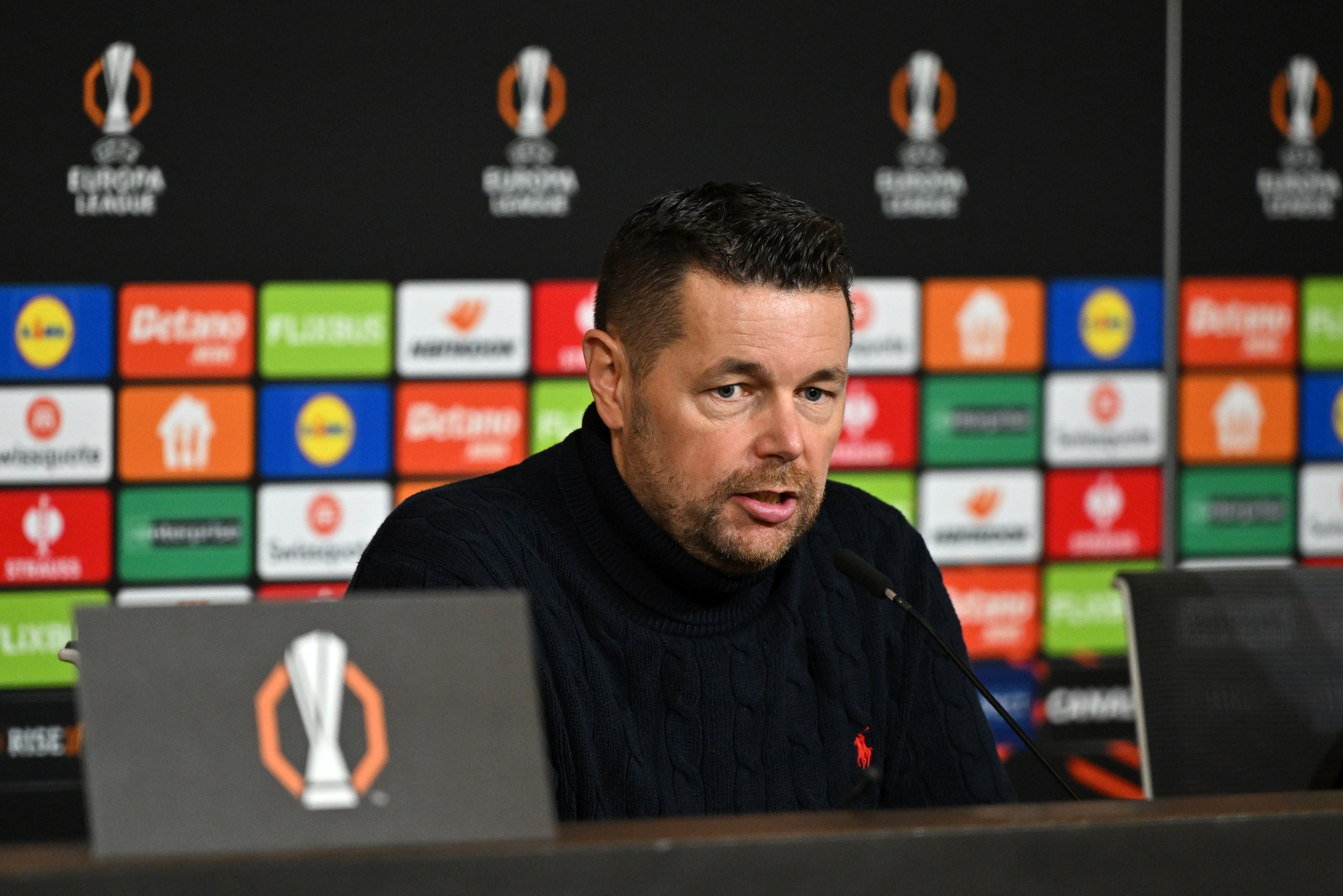 DECINES-CHARPIEU, FRANCE - OCTOBER 15: Pierre Sage, Manager of Crystal Palace, speaks to the media in the post match press conference after the team's defeat in the UEFA Europa League 2026/27 League Phase MD2 match between Olympique Lyonnais and Crystal Palace FC at OL Stadium on October 15, 2026 in Decines-Charpieu, France. (Photo by Chris Ricco - UEFA/UEFA via Getty Images)