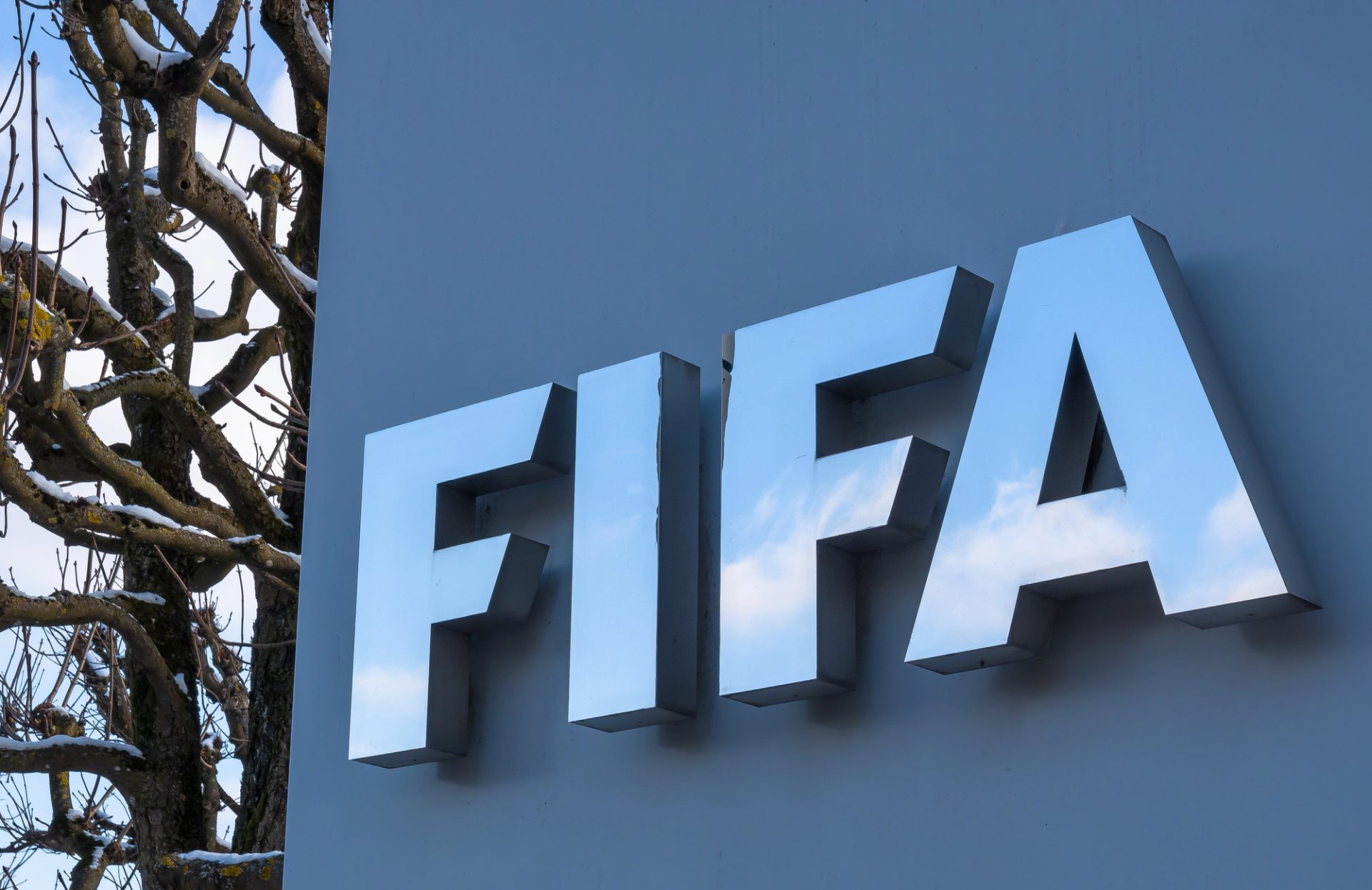 Zurich, Switzerland - January 10, 2021: FIFA is a non-profit organization and an international governing body of association football, futsal and beach soccer. Headquarter in Zurich, Switzerland — Photo by taldav68
