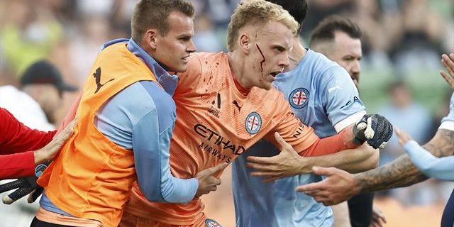 Shocking scenes as goalkeeper attacked and match abandoned in Melbourne derby