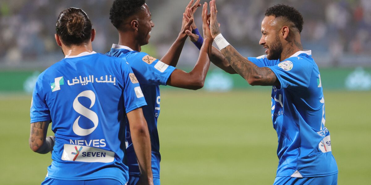 Hilal's Brazilian forward #10 Neymar (R) congratulates Hilal's Saudi midfielder #16 Nasser al-Dawsari for his goal during the Saudi Pro League football match between Al-Hilal and Al-Riyadh at Prince Faisal Bin Fahd Stadium in Riyadh on September 15, 2023. (Photo by Fayez Nureldine / AFP)