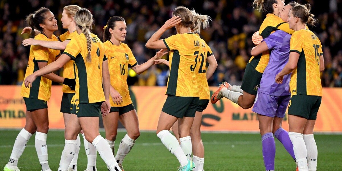 Australian players celebrate after they defeated France in the women's International football friendly match between Australia and France at Marvel Stadium in Melbourne on July 14 2023. (Photo by William WEST / AFP) / -- IMAGE RESTRICTED TO EDITORIAL USE - STRICTLY NO COMMERCIAL USE --  - -- IMAGE RESTRICTED TO EDITORIAL USE - STRICTLY NO COMMERCIAL USE --