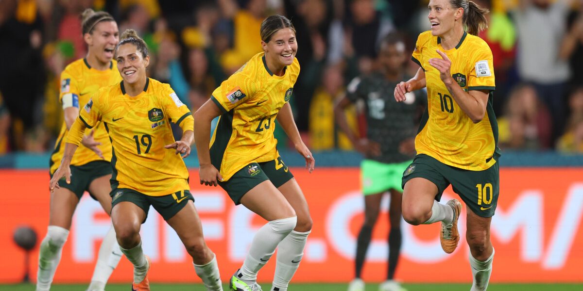 BRISBANE, AUSTRALIA - JULY 27: Emily Van-Egmond (1st R) of Australia celebrates with teammates after scoring her team's first goal during the FIFA Women's World Cup Australia &amp; New Zealand 2023 Group B match between Australia and Nigeria at Brisbane Stadium on July 27, 2023 in Brisbane / Meaanjin, Australia. (Photo by Chris Hyde - FIFA/FIFA via Getty Images)