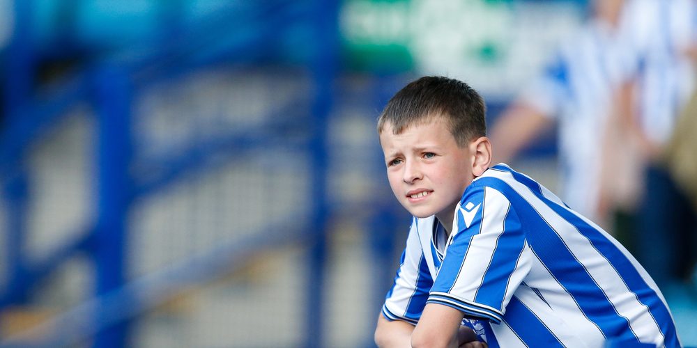A fan of Sheffield Wednesday watches on — Photo by operations@newsimages.co.uk