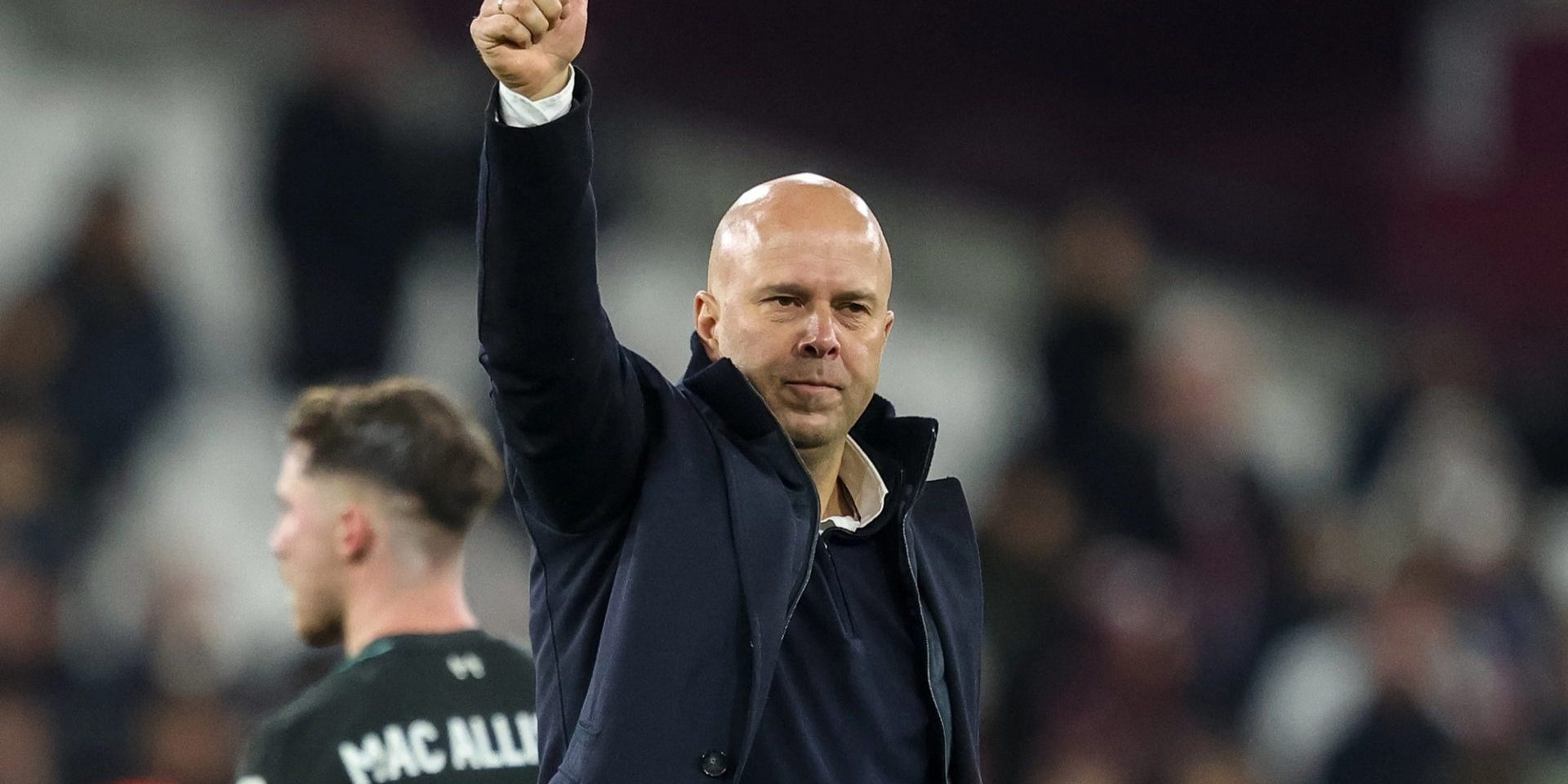 Arne Slot manager of Liverpool gives the traveling fans the thumbs up after winning 0-5 during the Premier League match West Ham United vs Liverpool at London Stadium, London, United Kingdom, 29th December 2024 — Photo by operations@newsimages.co.uk