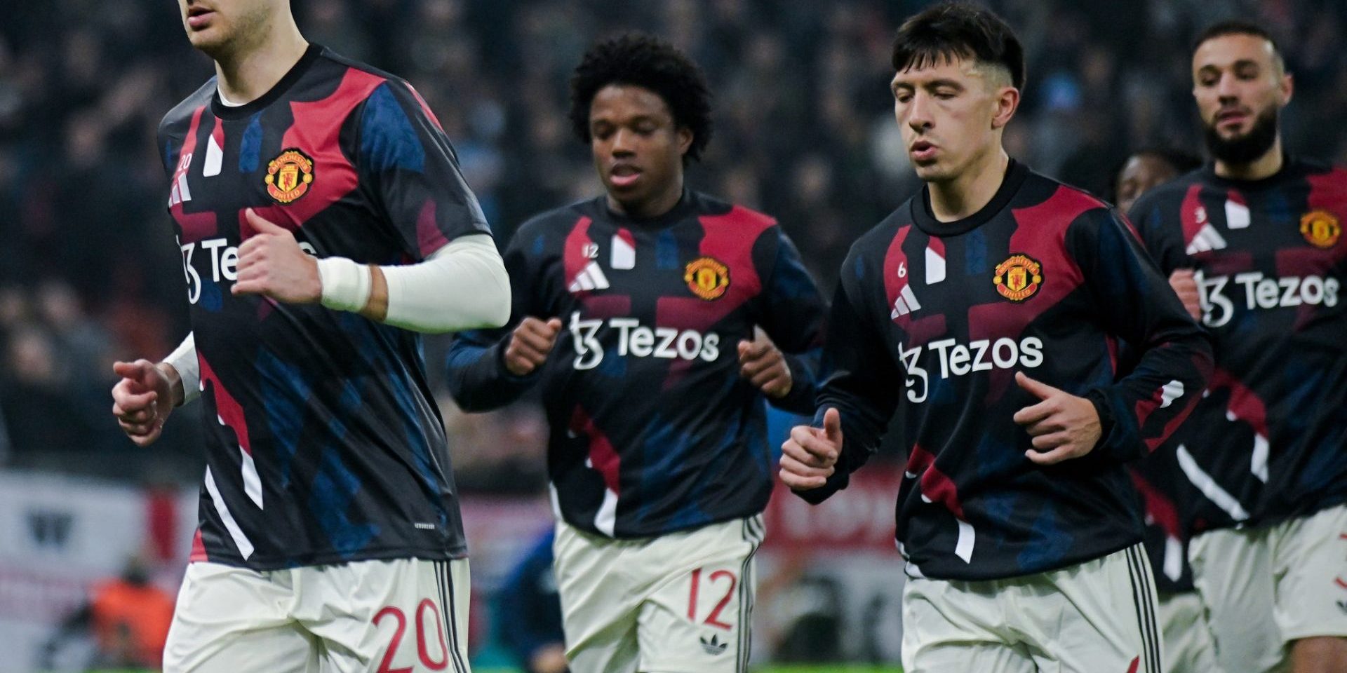 Diogo Dalot and Lisandro Martinez pictured prior to the UEFA Europa League Group Stage game between FCSB (Romania) and Manchester United (England) held on 30th of January 2025 at National Arena in Bucharest. — Photo by CosminIftode