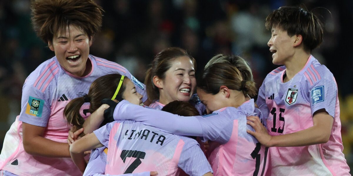 Japan's defender #02 Risa Shimizu (C) celebrates with her teammates after scoring her team's second goal during the Australia and New Zealand 2023 Women's World Cup round of 16 football match between Japan and Norway at Wellington Regional Stadium in Wellington on August 5, 2023. (Photo by Marty MELVILLE / AFP)