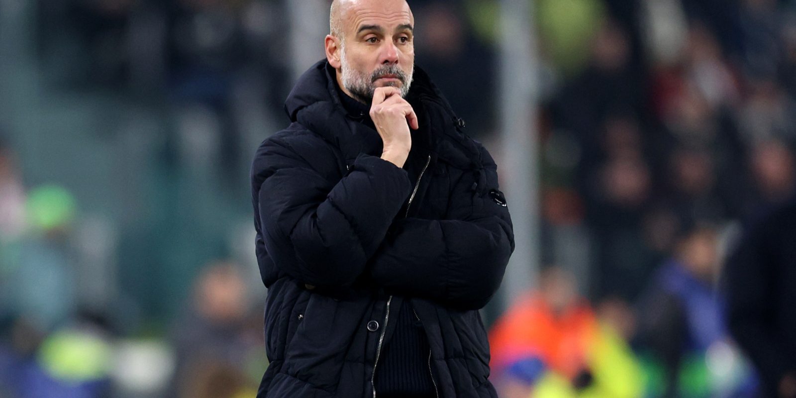 TURIN, ITALY - DECEMBER 11: Pep Guardiola, Manager of Manchester City, looks on during the UEFA Champions League 2024/25 League Phase MD6 match between Juventus and Manchester City at Juventus Stadium on December 11, 2024 in Turin, Italy. (Photo by Francesco Scaccianoce - UEFA/UEFA via Getty Images)