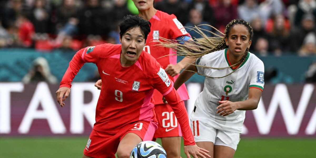 South Korea's forward #09 Lee Geum-Min (L) and Morocco's forward #11 Fatima Tagnaout vie for the ball during the Australia and New Zealand 2023 Women's World Cup Group H football match between South Korea and Morocco at Hindmarsh Stadium in Adelaide on July 30, 2023. (Photo by Brenton EDWARDS / AFP)