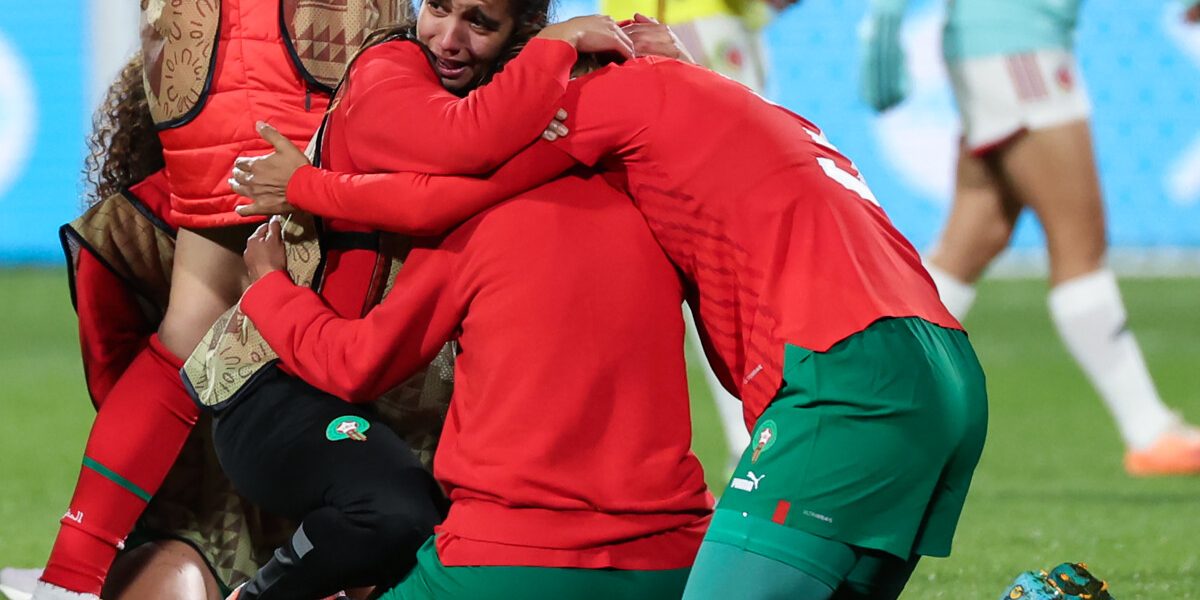 Morocco players celebrate victory after the end of the Australia and New Zealand 2023 Women's World Cup Group H football match between Morocco and Colombia at Perth Rectangular Stadium in Perth on August 3, 2023. (Photo by Colin MURTY / AFP)