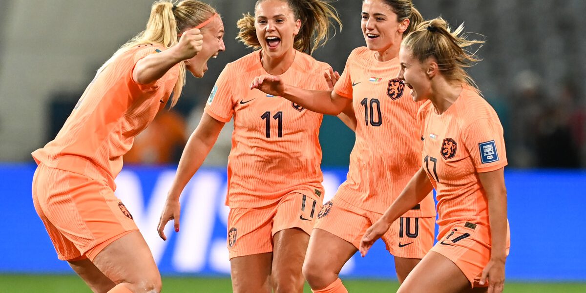 Netherlands' defender #03 Stefanie van der Gragt (L) celebrates with her teammates after scoring her team's first goal during the Australia and New Zealand 2023 Women's World Cup Group E football match between the Netherlands and Portugal at Dunedin Stadium in Dunedin on July 23, 2023. (Photo by Sanka Vidanagama / AFP)