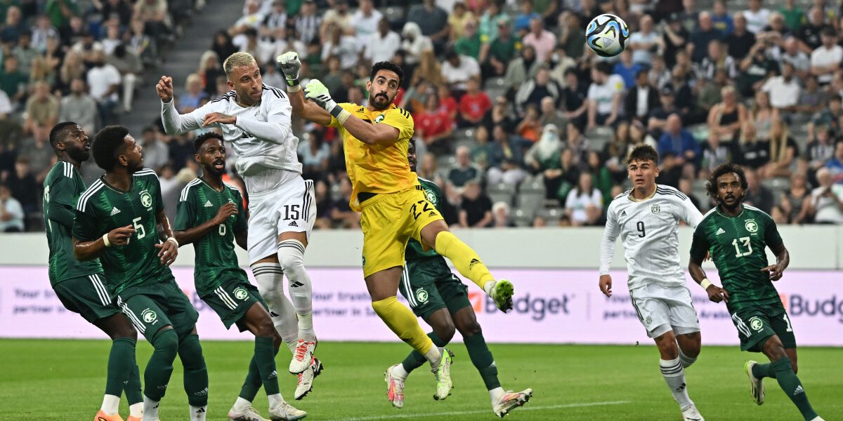 Costa Rica's defender Francisco Calvo (C-L) scores a header during the international friendly football match between Saudi Arabia and Costa Rica at St James' Park in Newcastle-upon-Tyne, northeast England, on September 8, 2023. (Photo by Oli SCARFF / AFP)