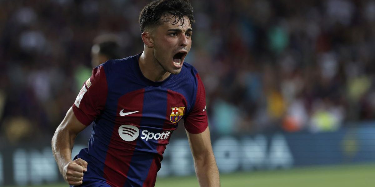 Barcelona gets late goals to win first official match at its temporary new home