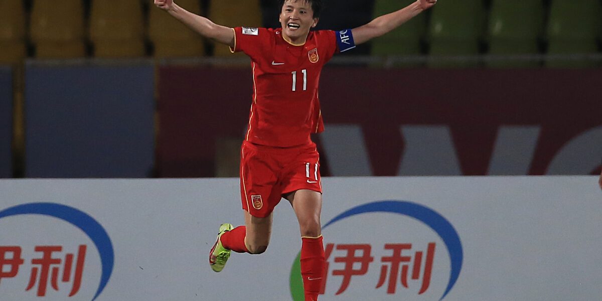 (220204) -- PUNE, Feb. 4, 2022 (Xinhua) -- Wang Shanshan of China celebrates after scoring a goal in penalty shootout during the semi-final football match between China and Japan at the 2022 AFC Women's Asian Cup in DY Patil Stadium of Navi Mumbai, India, Feb. 3, 2022. (Xinhua/Javed Dar)