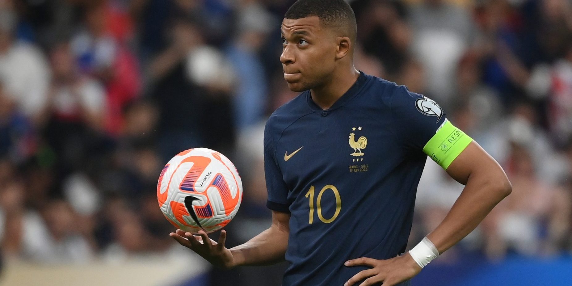 France's forward Kylian Mbappe looks on before taking a penalty shot during the UEFA Euro 2024 group B qualification football match between France and Greece at the Stade de France in Saint-Denis, in the northern outskirts of Paris, on June 19, 2023. (Photo by FRANCK FIFE / AFP)